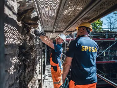 To further stabilize the walls, 524 masonry nails were installed including injections.